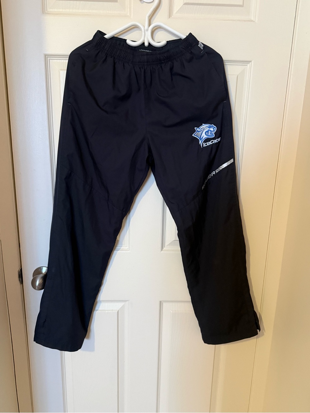 Bauer Black windbreaker pant with Blue Team Logo Youth XL